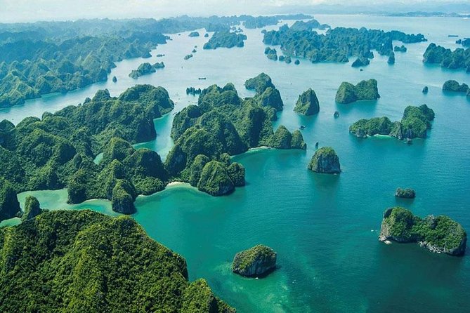Halong Bay Full Day Tour with All-Inclusive: Boat, Kayak, Island, Cave and Lunch - The oyster/pearl store stop: a sales detour you can manage