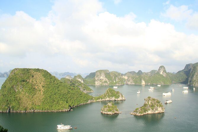 Halong bay full day trip: Visit Surprise cave, Titop island, kayaking & swimming - Surprise Cave hiking: 45 minutes of grottos and limestone stairs