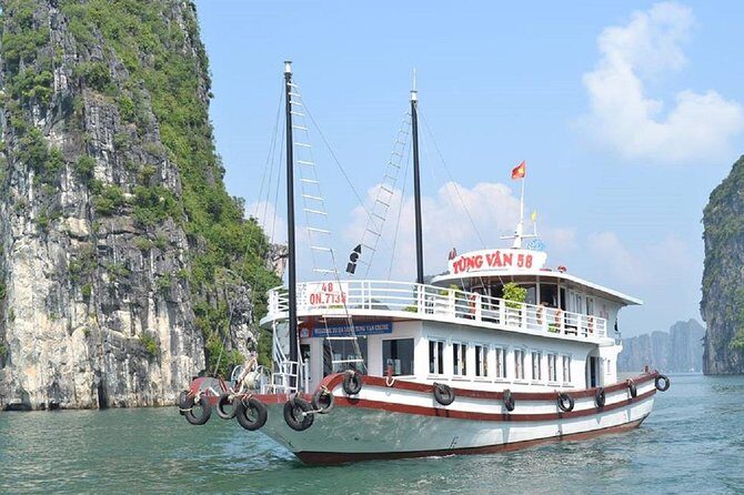 Halong Bay Islands and Caves: Full-Day Tour from Hanoi - Fighting Cocks Islet: a quick stop that helps you “read” the bay