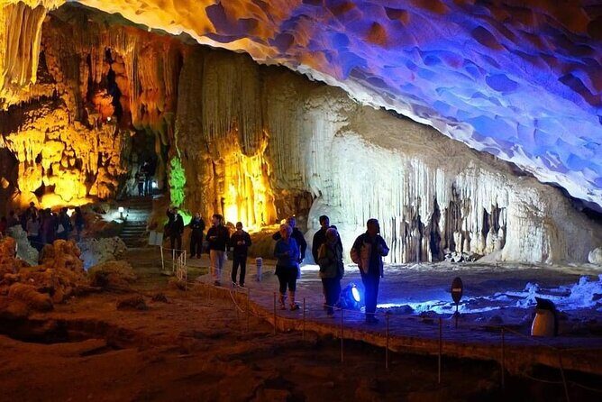 Halong Royal Palace Cruise 2 days - Sung Sot Cave on Day 2: Morning Tai Chi and Early Light