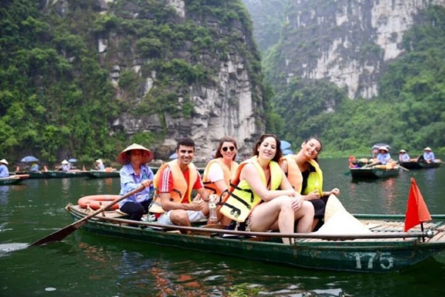 Hanoi: 2-Day Tour to Ninh Binh & Halong Bay With Transfer - Trang An by traditional wooden boat: calm water, sudden cave turns