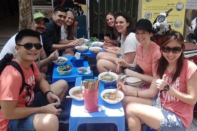 Hanoi City Street Food Night Tour by Motorscooter - Riding a Motorbike in Hanoi: Comfort, Rain Gear, and Safety Basics