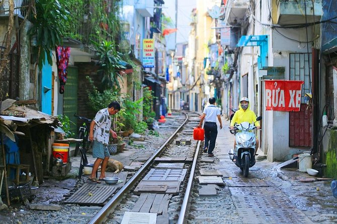 Hanoi city tour and drinking beside railway- group tour - Tran Quoc Pagoda on a West Lake Island: Calm + Big Old Stories