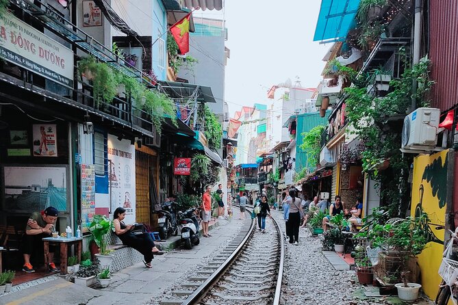 Hanoi city tour and drinking beside railway- group tour - How the Guides Shape the Whole Day (Timmy and Cam Thuy Stand Out)