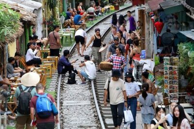 Hanoi City Walking Tour Discover Hidden Gems and Train Street - Hotel pickup and included drinks that keep the day on track