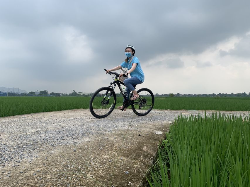Hanoi Countryside Bike Tour: Red River Culture & Daily Life - The ancient village gate stop: where the ride starts with context