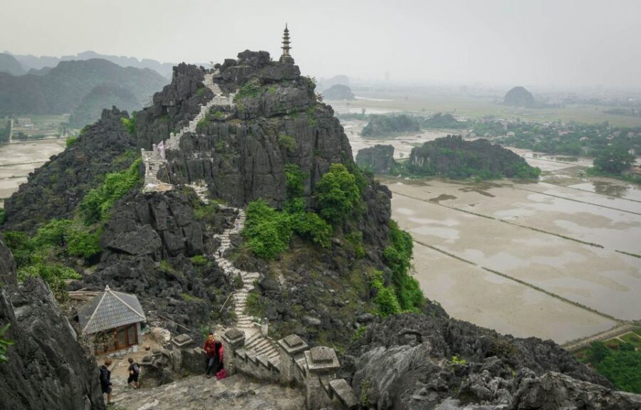 Hanoi: Full Day Guided Tour of Hoa Lu, Tam Coc, and Mua Cave - Tam Cốc Bamboo Boats: The Scenic Payoff