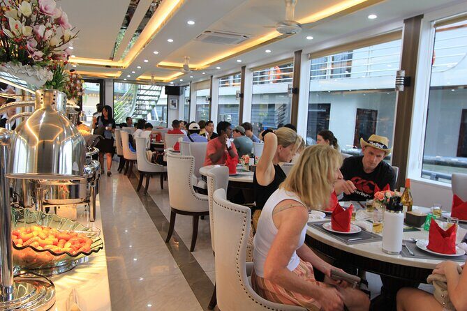 Hanoi - Ha Long Luxury Day Cruise with Kayak & Cave Adventure - Pearl Farm Stop in Hạ Long: Learning Before the Sights