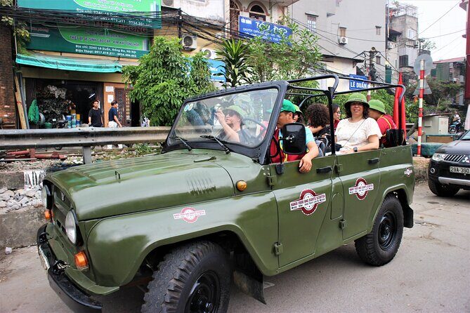 Hanoi Jeep Foodie Tours Led By Women - Stop 1 in the Old Quarter: flea market energy and the train-street area vibe