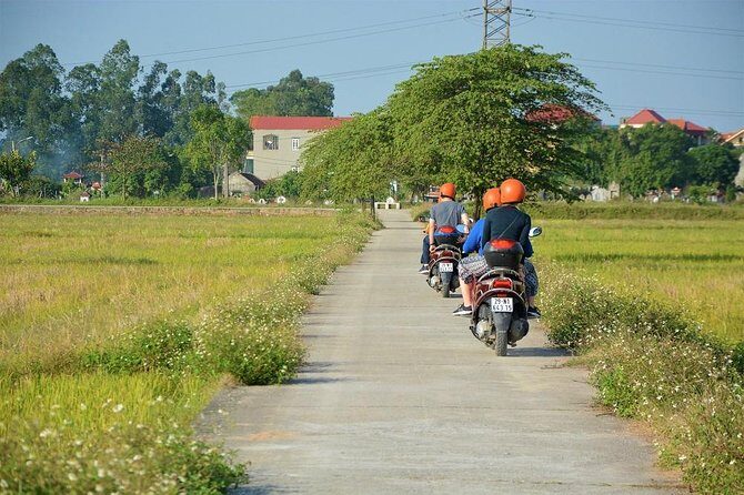 Hanoi Motorbike Food Tours: Hanoi Motorbike Tours Led By Women - Stop 2: Long Bien Bridge-area banh cuon at a local-famous café