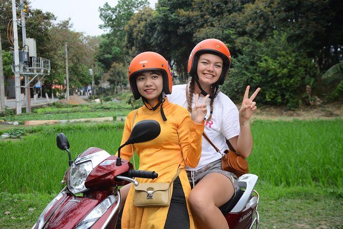 Hanoi Motorbike Food Tours: Hanoi Motorbike Tours Led By Women - Passing landmarks on the way to Train Street