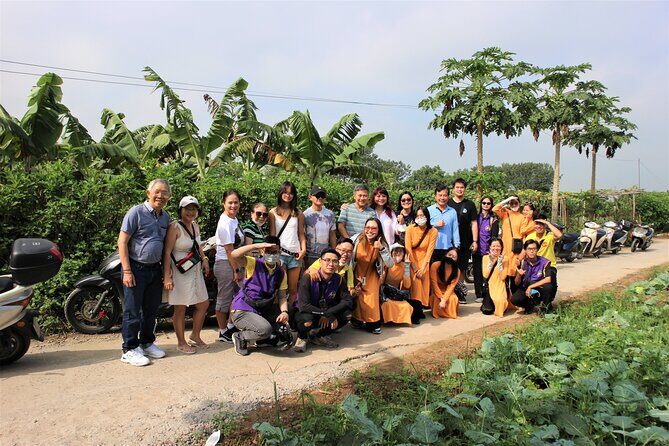 Hanoi Motorbike Tour Led By Women - West Lakes farm paths: flowers, vegetables, and banana scenery