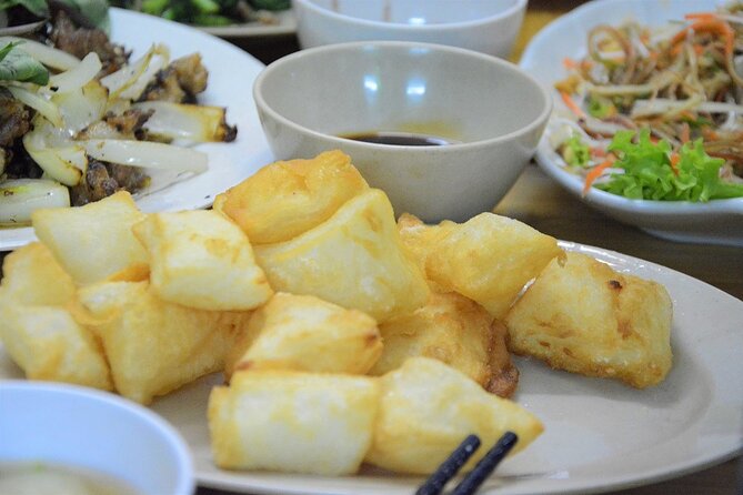 Hanoi Motorbike Tour Led By Women - City And Countryside Full Day - Co Loa Citadel and fruit-market breaks: history plus food you can taste