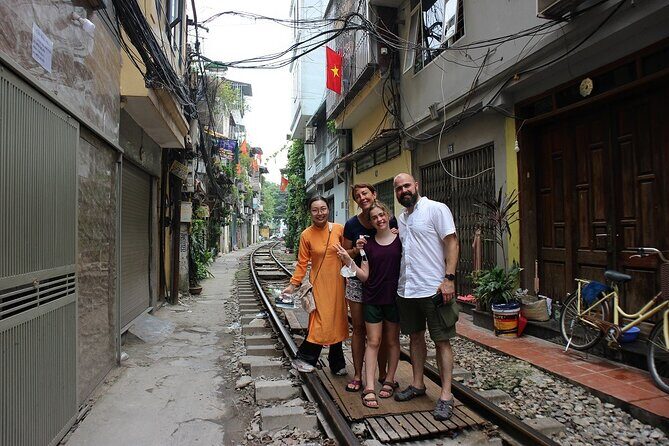 Hanoi Motorbike Tour Led By Women: Hanoi City Half Day - Dường Tau (Reunification Railway Track): When a Street Shares Space With Trains