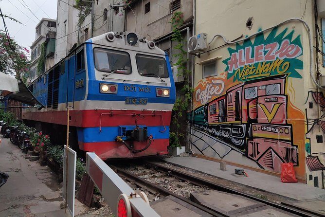 HANOI MUST SEE SITES Vespa Tour - Stop 3: French Quarter Avenues and Colonial-Style Buildings