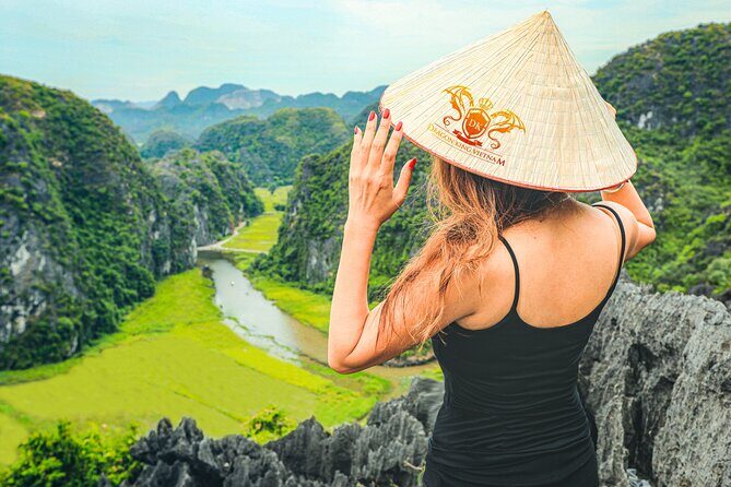 Hanoi, Ninh Binh and Ha Long 6 Day 5 Night Overnight Cruise Tour - Day 5: Tai Chi on the Sundeck, Breakfast on Board, Cat Ba Biosphere Stop, and Trung Trang Cave