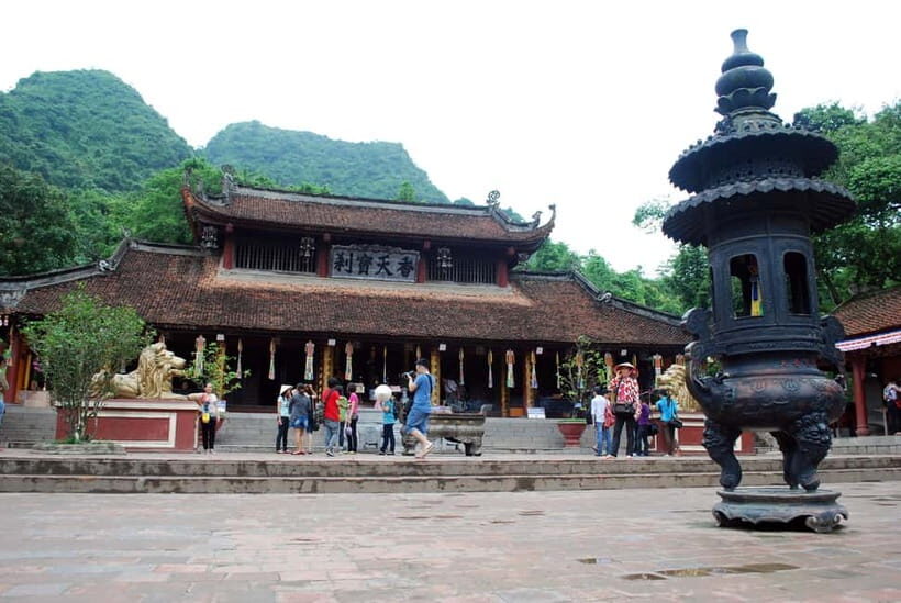 Hanoi: Perfume Pagoda Day Tour with Boat Ride & Cave Visit - Arrival at Perfume Pagoda: Where Temples Feel Like a Living Place