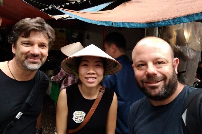Hanoi Street Food tour by Scooter – Local Experience - Market Night and a Drink in an Old Hanoi Apartment