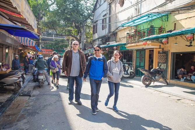 Hanoi Street Food Walking Tour and Water Puppet Show - Stop 1: From Hotel Pickup to Old Quarter Food Stalls