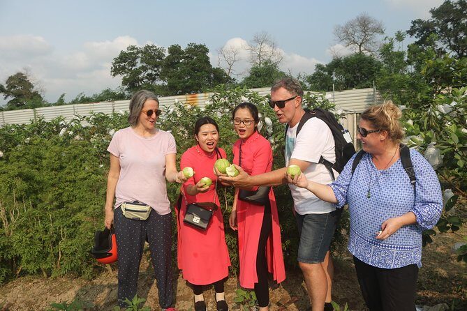 Hanoi Vespa Full Day City & Countryside with Female Ao Dai Riders - Duờng Tau railway houses: seeing life close to the tracks