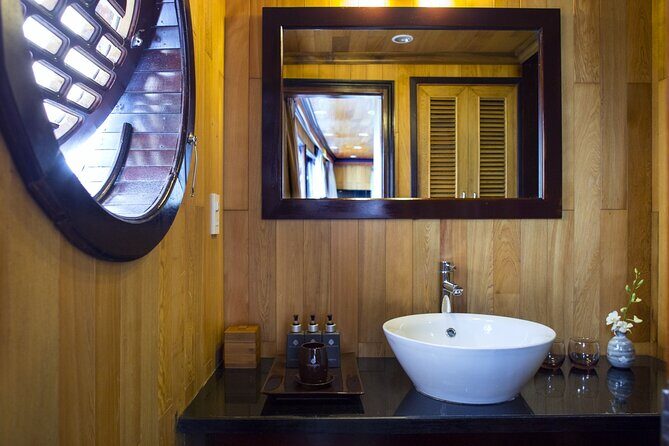 Hera Classic Cruise 2 Days 1 Night Halong Bay With BALCONY CABINS - Day 2 at 6:15: Tai Chi, light breakfast, and Sung Sot Cave