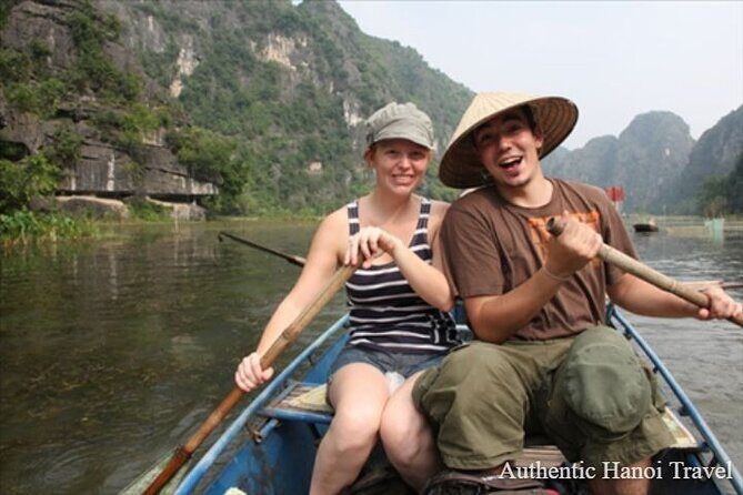 Hoa Lu Tam Coc 1 Day Group Tour (Biking- Boating-Cave Exploring) - Bamboo boats on the Tam Cốc river: the day’s calm centerpiece