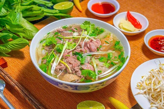(HOT) Hanoi Guided Street Food and Train Street Tour with Local - Stop 2: St. Joseph’s Cathedral for a quick, scenic reset