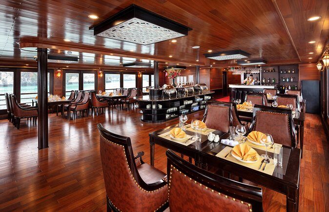 Luxury 4<em> Cruise 2Days 1night Ha Long Bay – V'spirit Premier Cruise – Quick hits’ /></p>
<ul>
<li><strong>Lan Ha Bay route (less crowded feel)</strong> than the most famous Ha Long side</li>
<li><strong>Private balcony cabins</strong> on a modern 3-deck ship with Vietnamese-inspired decor</li>
<li><strong>Dark & Bright caves by sampan</strong>, plus time to swim where allowed</li>
<li><strong>Tai chi on the top deck at sunrise</strong>, then kayaking in Tra Bau</li>
<li><strong>Chef cooking demo</strong> and a lunch buffet that fits the cruise tempo</li>
<li><strong>Group size up to 35</strong> with WiFi onboard and air-conditioned transfers</li>
</ul>
<h2 id="vspirit-premier-cruise-what-luxury-looks-like-here">V’Spirit Premier Cruise: what luxury looks like here</h2>
<p><img width="669" height="446" decoding="async" src=