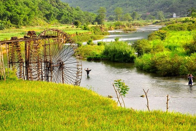 Mai Chau Private Day Tour: Hiking & Biking in Pristine Landscapes - Cycling around Lac Village and Pom Coong Village