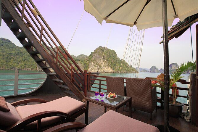 Mila Cruises 2 Days Explore Halong Bay from Hanoi - Day 2 sunrise routine: Tai Chi on deck, then Ti Top Island (Titov)