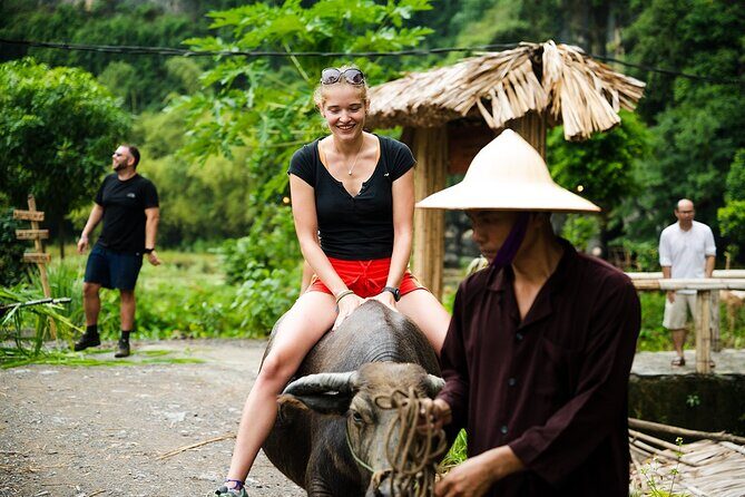 Ninh Binh eco group tour - Buffalo riding, rice planting, fishing - Rice planting in the fields: what “eco” looks like in real life