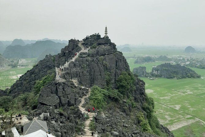 Ninh Binh Hoa Lu Tam Coc Mua Cave Boat & Bike Day trip from Hanoi: best selling - A fast route from Hanoi: Hoa Lu, Tam Coc, Mua Cave in one long day
