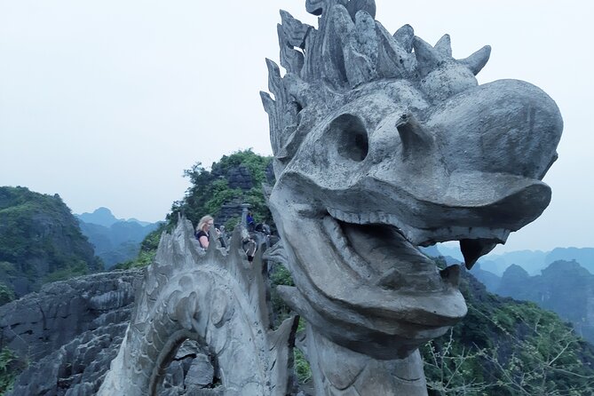 Ninh Binh luxury Day trip to Mua Cave, Tam Coc, Bich Dong, Boat & Bike - Mua Cave and the Dragon Mountain hike: where your pictures come from