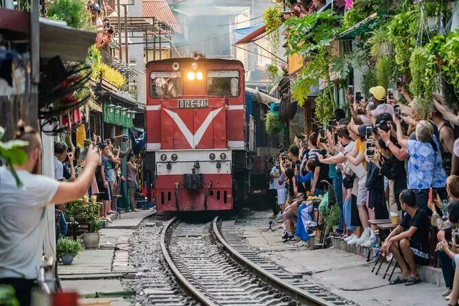 Private Hanoi Food Tour with Train Street and Local Delights - Who your guide is, and why their role matters