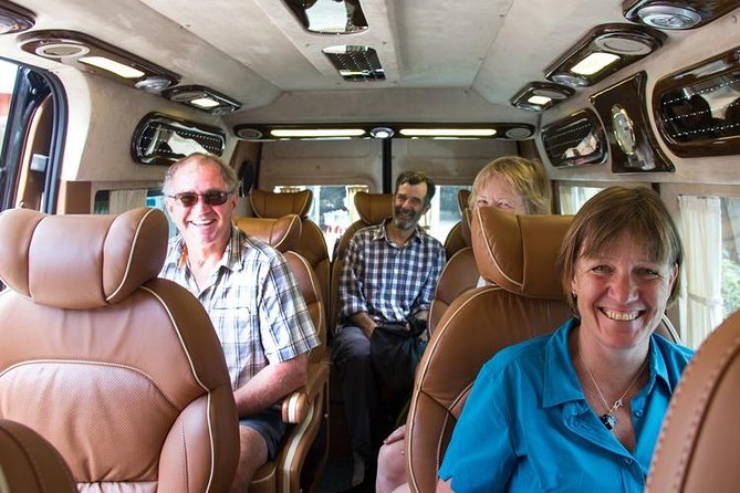 Private Transfers Hanoi <=> Halong One Way by Limousine Vehicles - The vehicle and driver setup: eight seats, basic English, and baby-seat comfort
