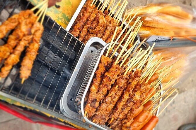 Private Walking Food Tour in Hanoi - Stop 2: Hoan Kiem Walking Street and the center-of-Hanoi feel