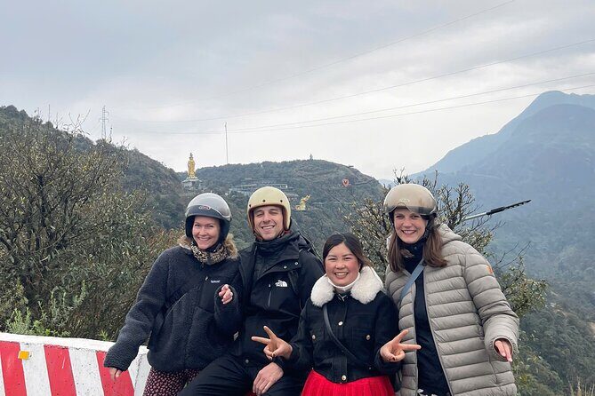 Sapa Motorbike Tour With Waterfalls O Quy Ho Pass From Sapa/Hanoi - The Sapa countryside stop: flowers, fields, and a Fanxipan shadow
