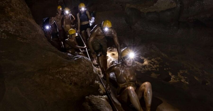 Tour Phong Nha-Ke Bang National Park 2 days 1 night - Dark Cave: headlamp gear, swimming on Thuy Tien, and the mud-bath moment
