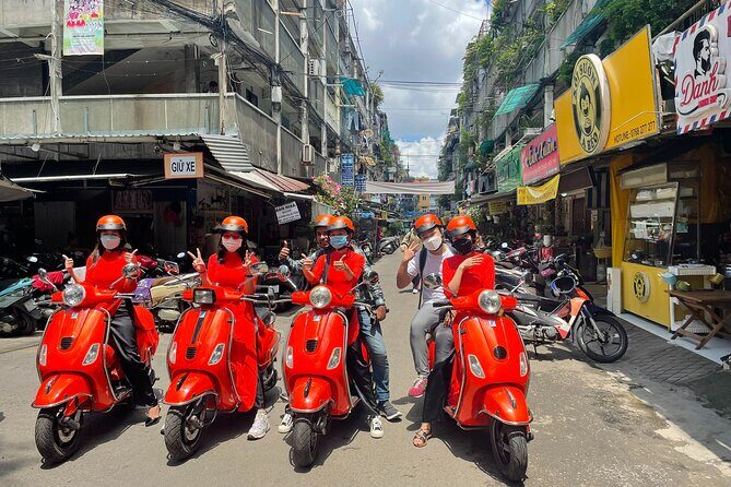 Vespa Female Ao Dai riders Night Street Food + See Train Street - Why a female Vespa night tour works so well in Hanoi