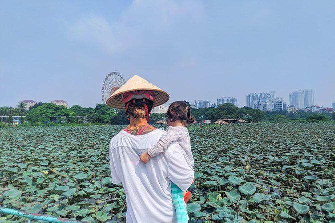 West Lake Journey by E-Bike - The e-bike setup: helmets, rain gear, and easy riding